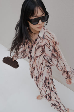 CAMISA SEMITRANSPARENTE ESTAMPADA