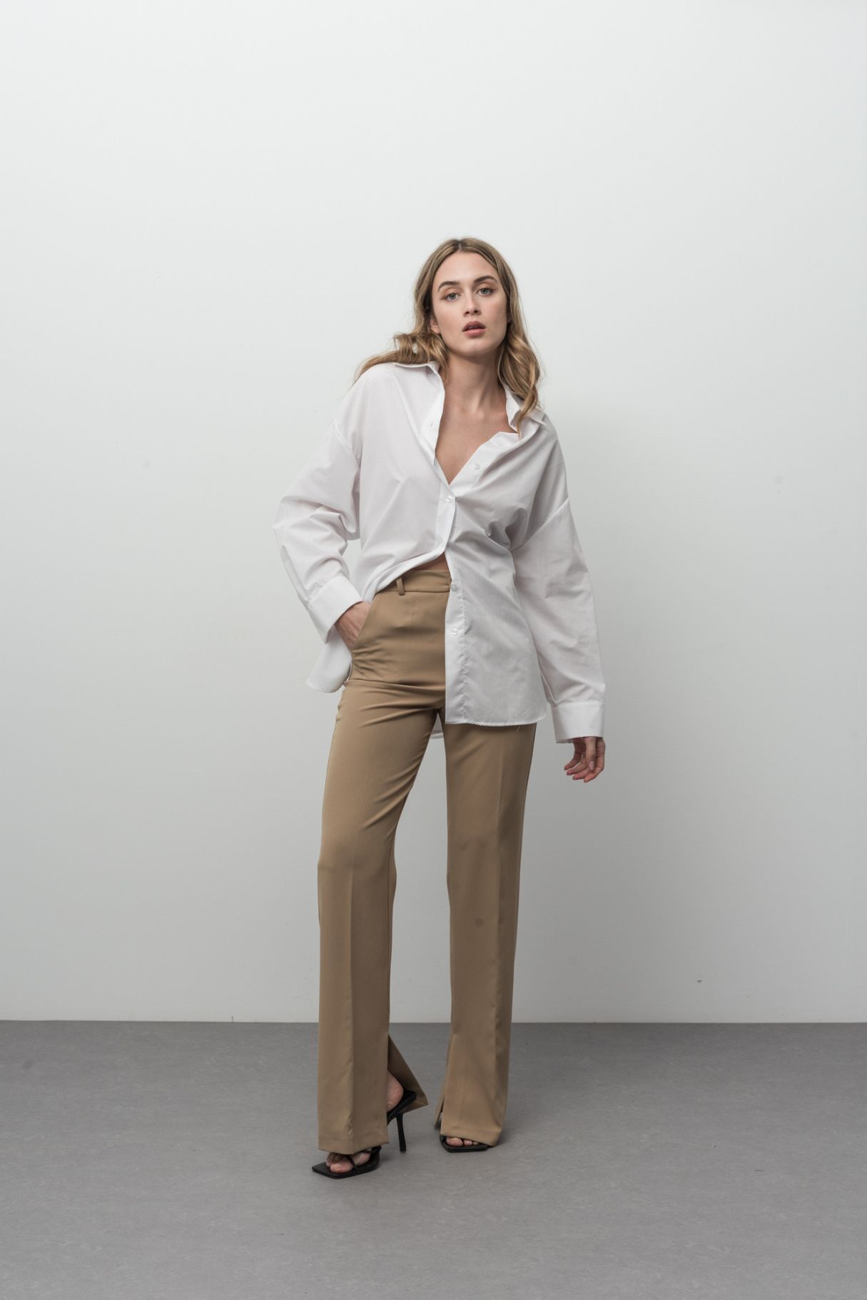 TROUSERS WITH SPLIT HEMS