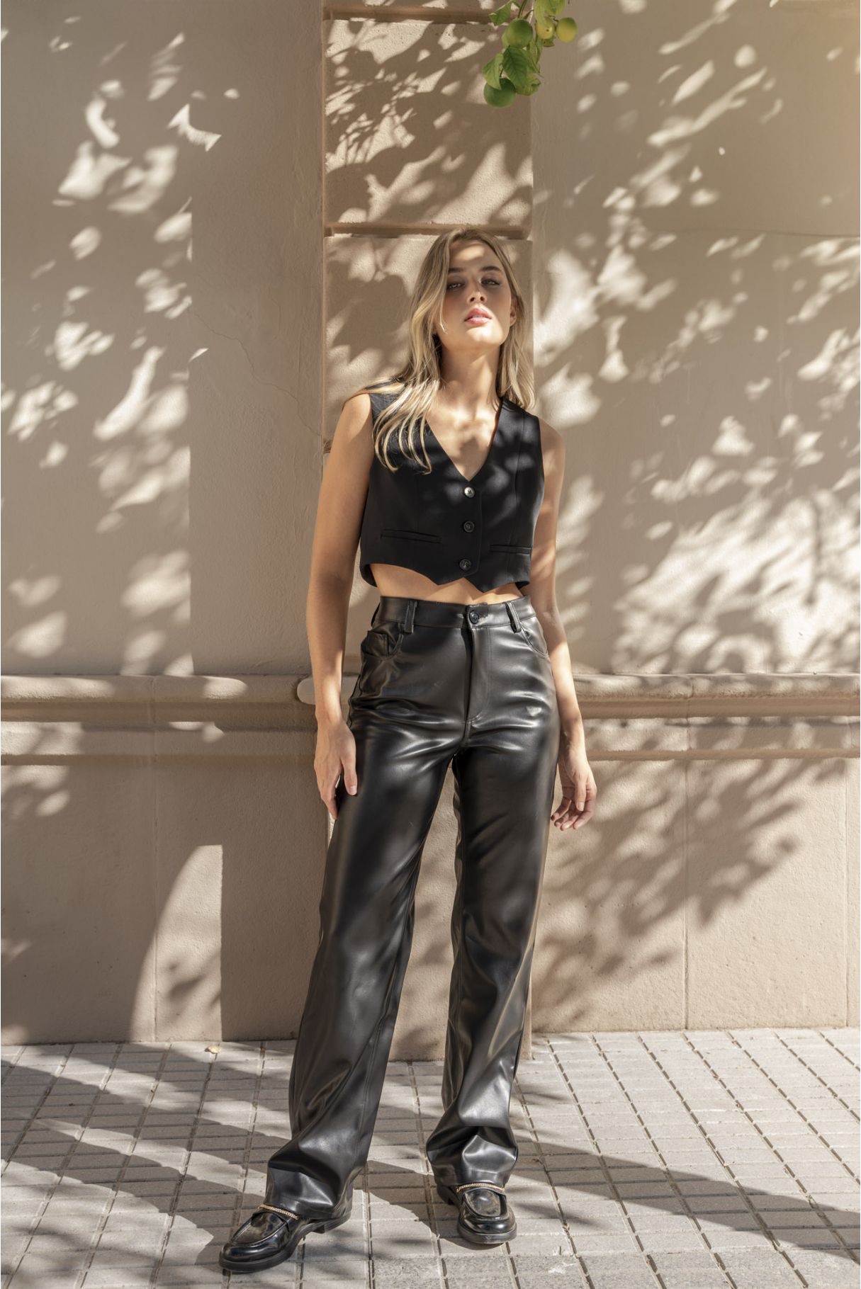 LEATHER EFFECT TROUSERS