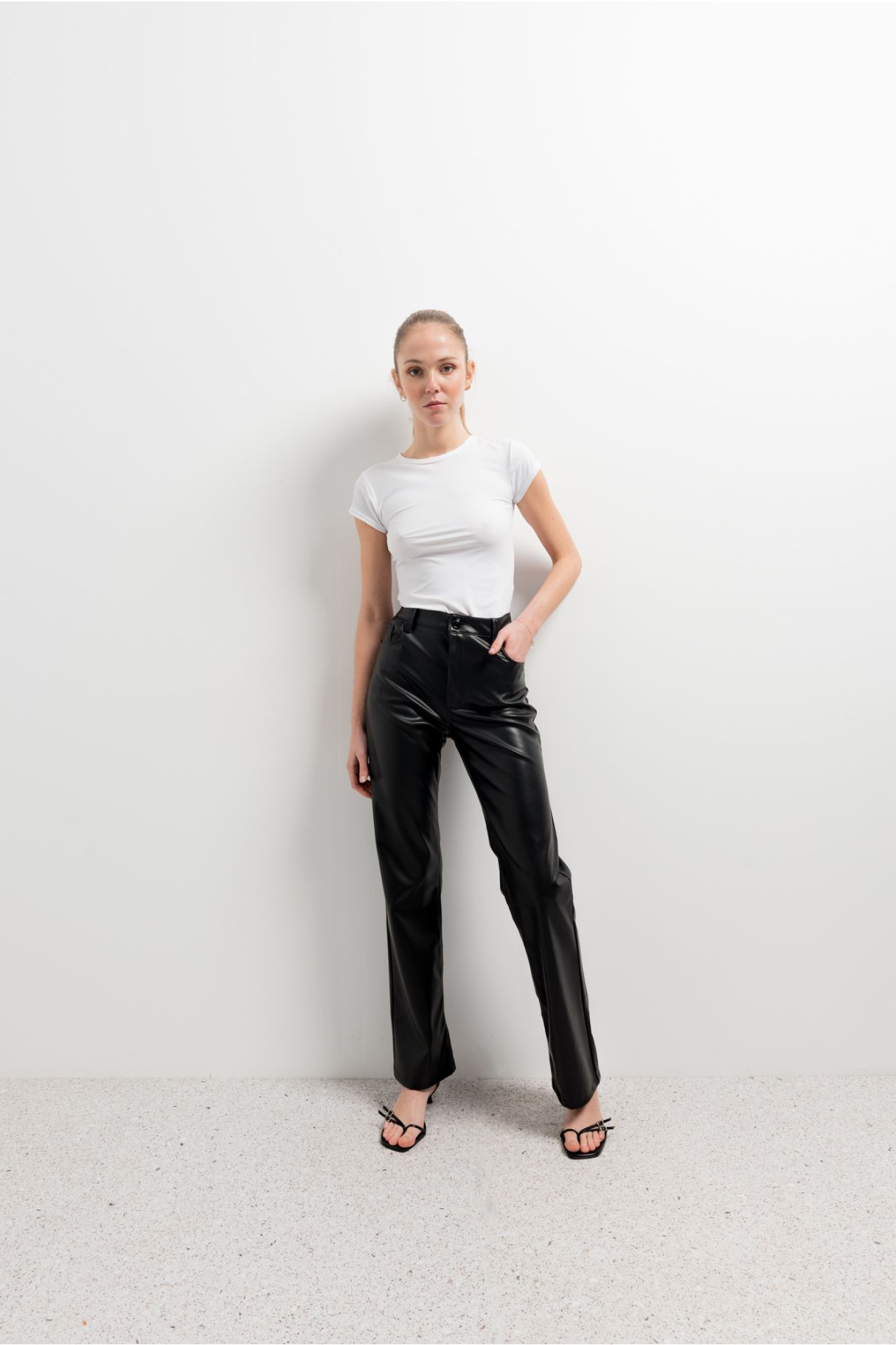 LEATHER EFFECT TROUSERS